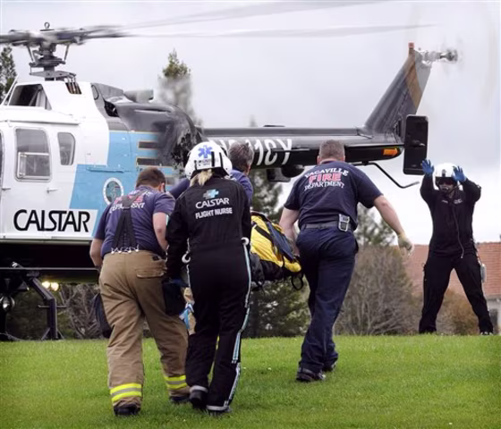 Vacaville and CALSTAR paramedics carry a bomb victim to an air ambulance at Ridgeview Park&nbsp;on March 27. According to police, at about 10:30 a.m.,&nbsp;an elderly man on Cashel Circle was severely injured when a possible pipe bomb wrapped inside of a newspaper exploded in his driveway. Numerous bomb squads responded to the scene as police evacuated residents from homes and blocked off a wide radius after an additional suspicious package was located in the area.